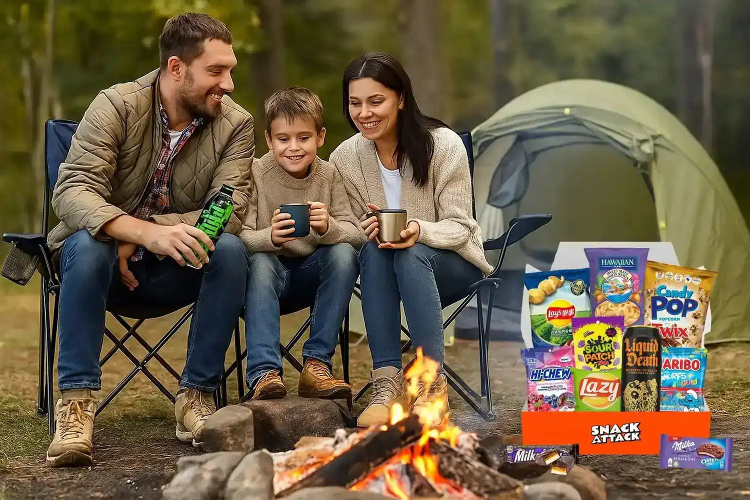 A family of three camping around a campfire with snacks.