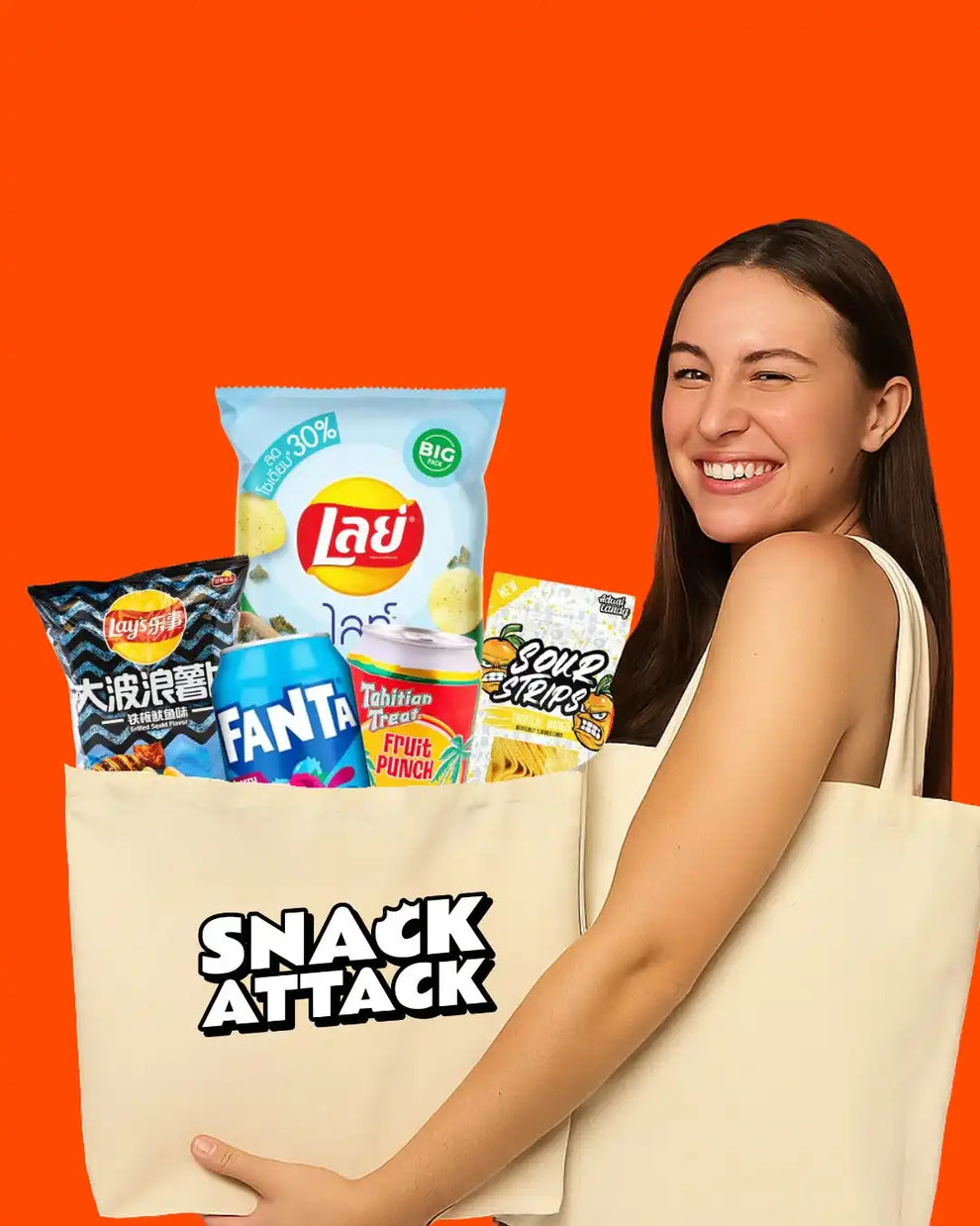 A woman holding two canvas tote bags filled with assorted snacks.